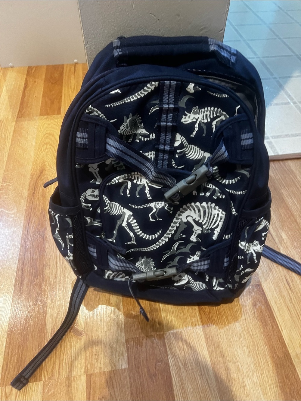Pottery Barn small Navy Dinosaur Skeleton Print Backpack